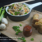Mushroom Baby Corn Schezwan Fried Rice & Vegetable Spring Rolls